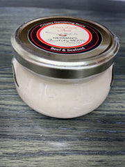 small glass jar of Lisa's Local Aioli on table
